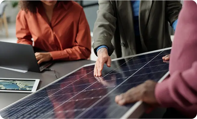 People discussing solar technology for homes and business.