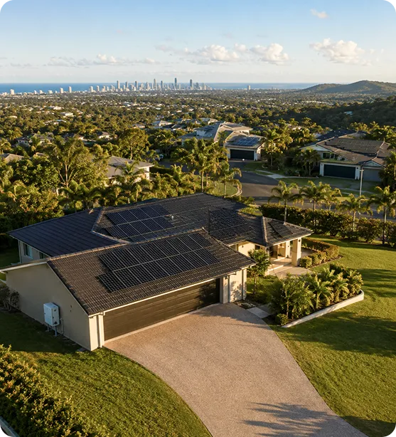 Modern South East Queensland home with black monocrystalline solar panels overlooking a suburban landscape.